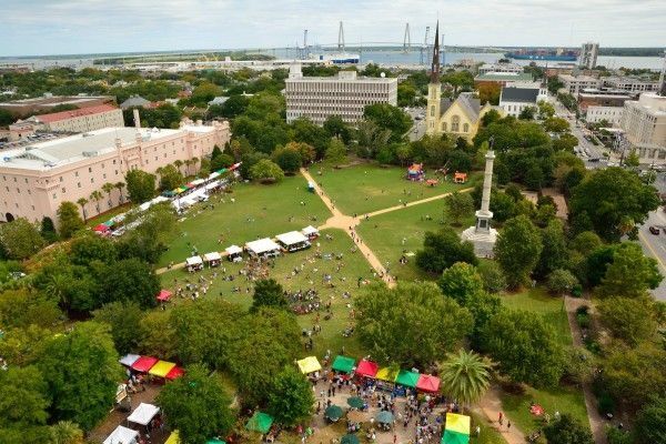 An aerial image of the park with an multiple tents set up for an event.