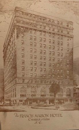 A postcard of the hotel in black and white. THe building's exterior is show and at the bottom it reads The Francis Marion Hotel Charleston S.C.